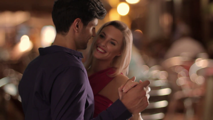 slow-motion-of-a-couple-dancing-on-the-street-at-night_7jhefgzc__f0000