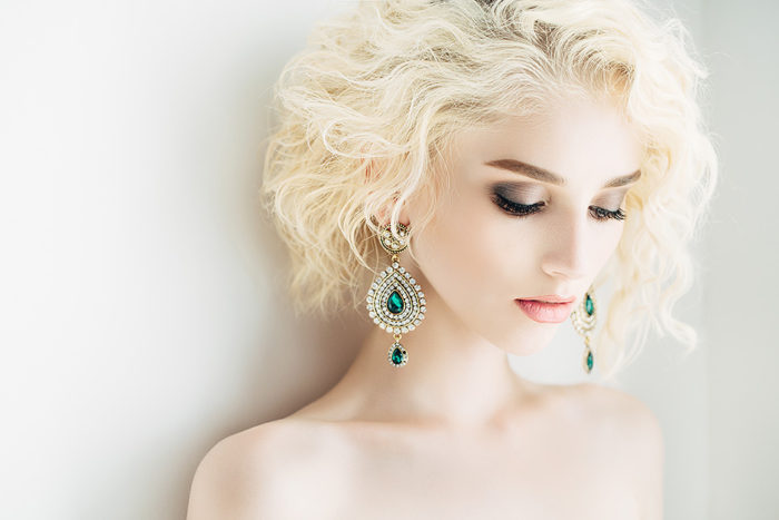 Beautiful woman with beautiful earings and hairstyle