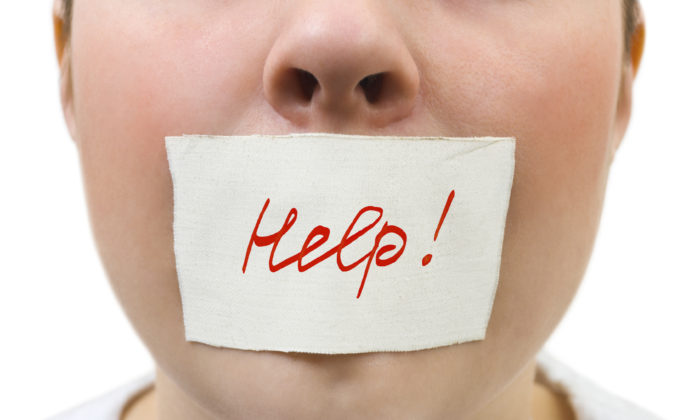 Tape over mouth isolated on white background