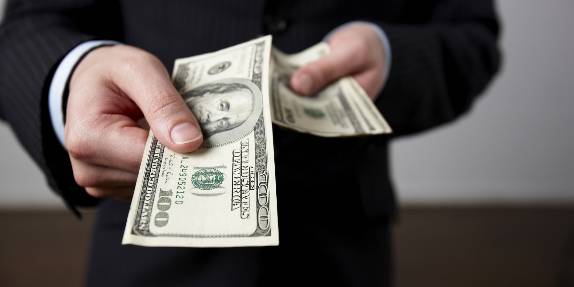 Businessman offering money