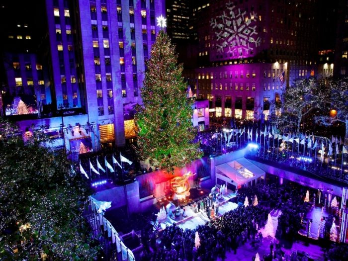 The Rockefeller Center Christmas tree is lit during the 80th annual tree lighting ceremony at Rockefeller Center in New York. (Kathy Willens/Associated Press)