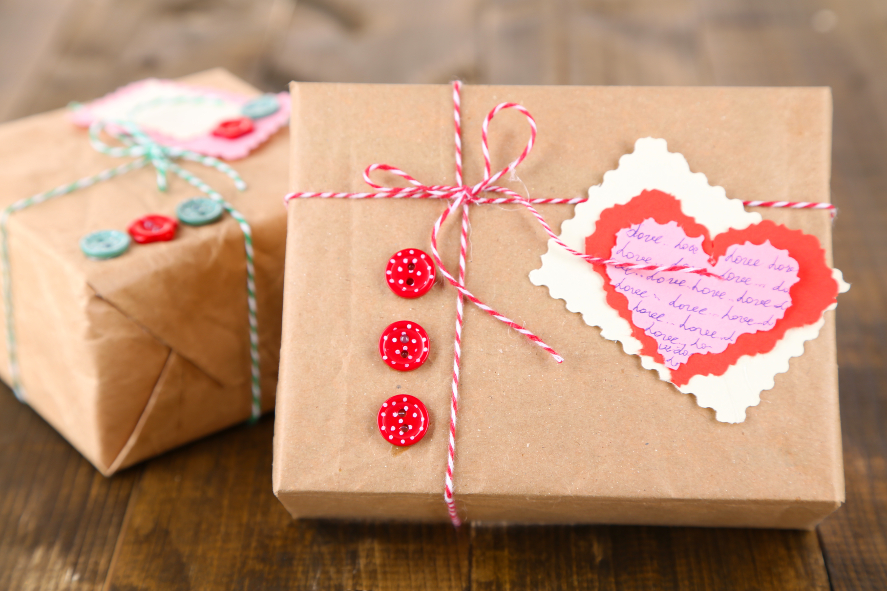 Paper gift boxes on wooden background